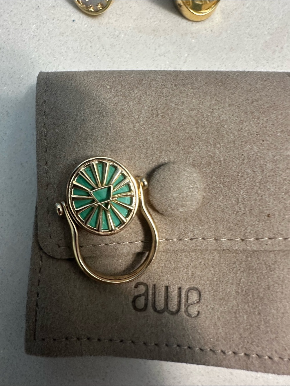 Awe inspired earth element Taurus Gold Toned Ring with Mint Green Enamel